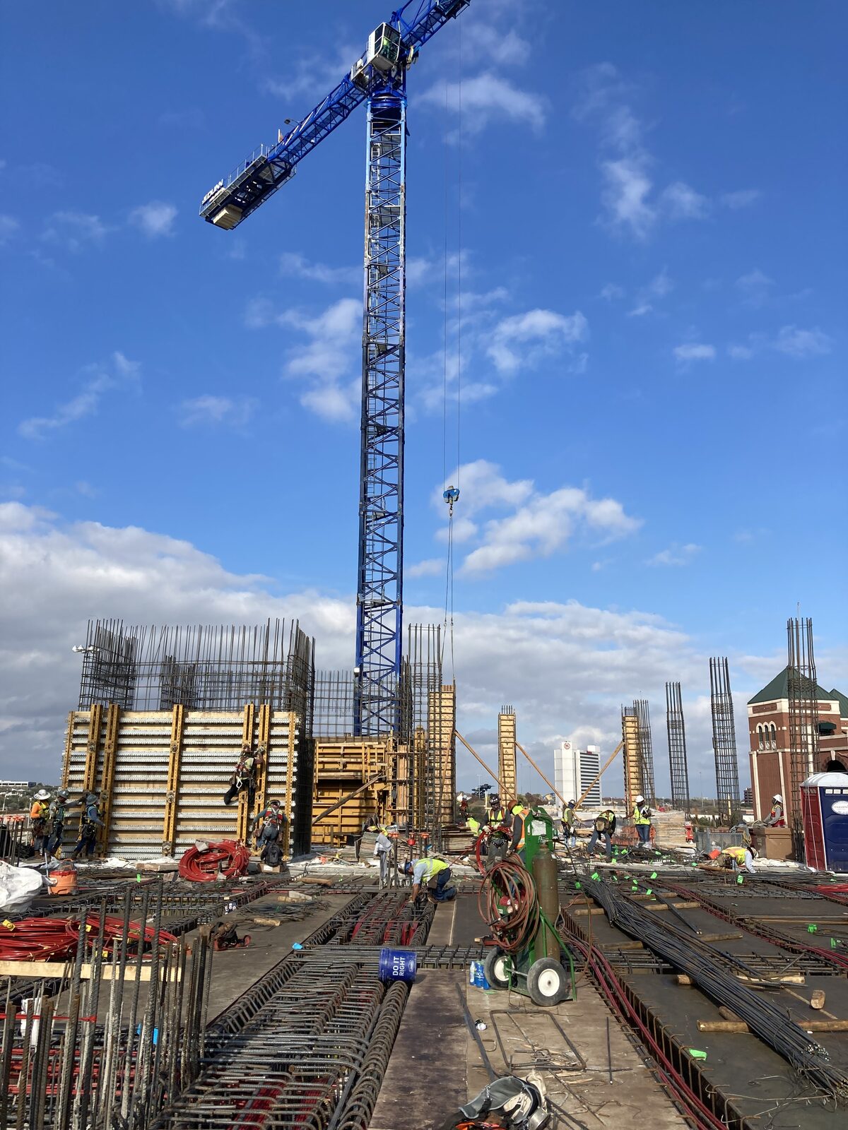 Tower crane over a high-rise commercial construction site